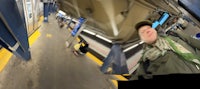 a person on a skateboard in a subway station